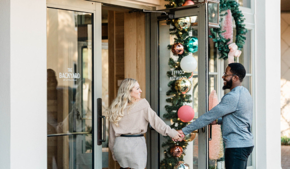couple entering a holiday entrance