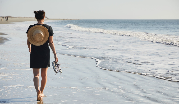 Woman walking on the beach