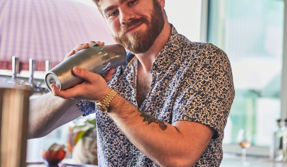 Bartender shaking a cocktail
