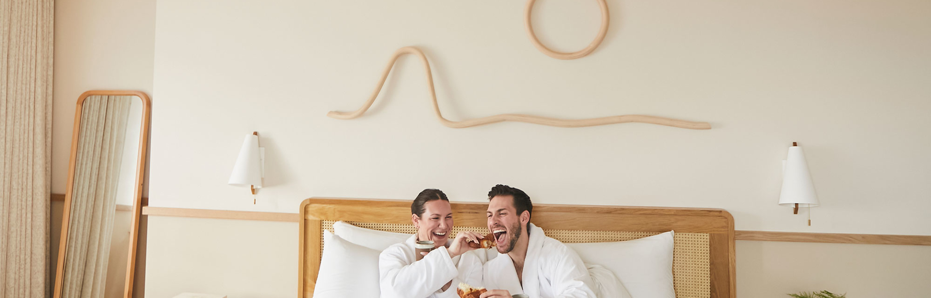 Couple having breakfast in bed