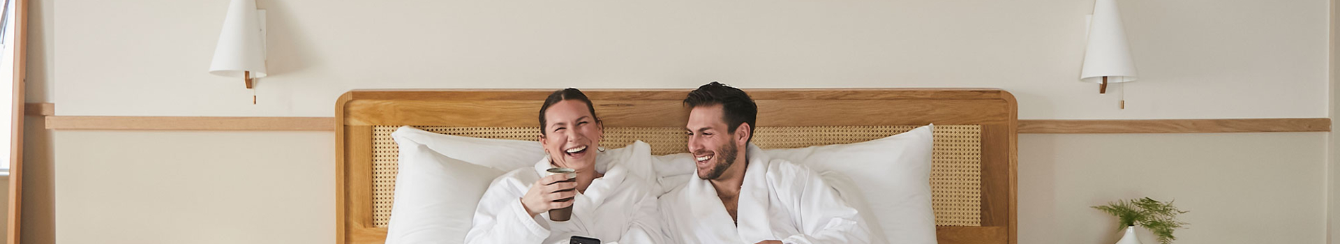 A couple having breakfast in bed
