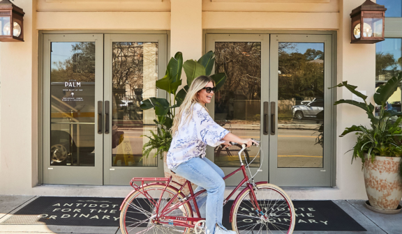 A woman riding a bike