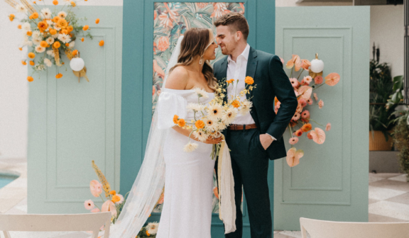 A couple kissing at the altar