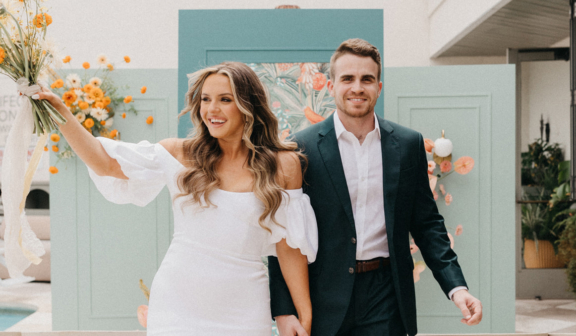 A couple kissing at the altar