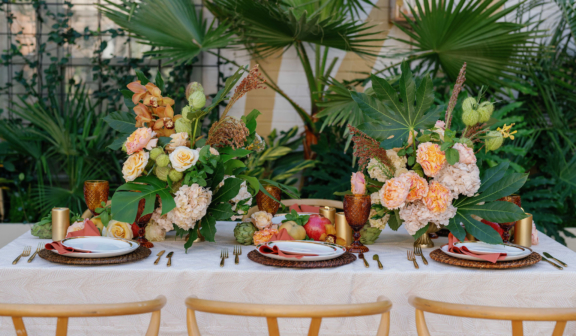 Table setting with flowers and fruit