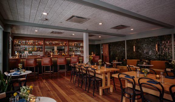 dining room and bar with wood accents